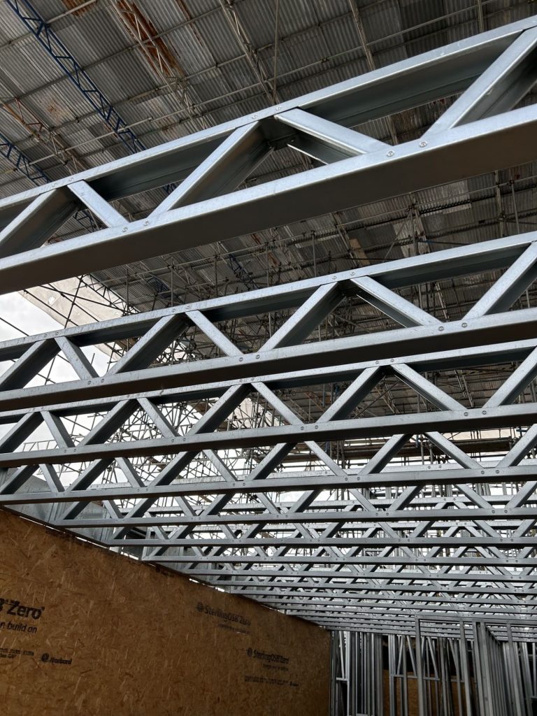 Steel access structure under temporary roof